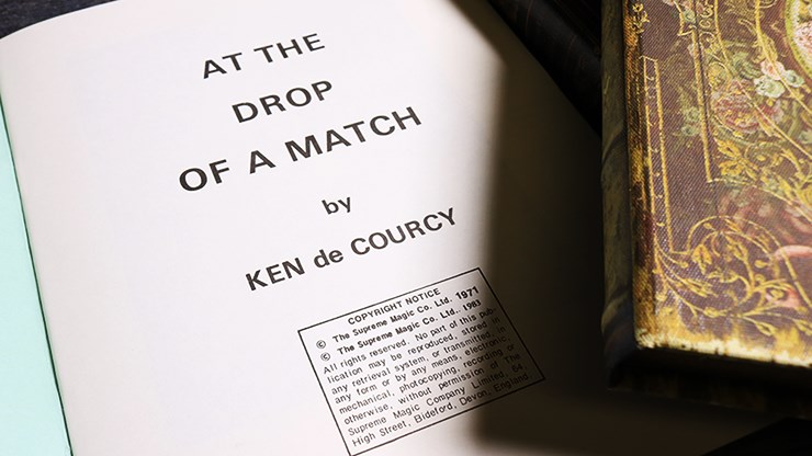 At the Drop of a Match by Ken De Courcy Book 